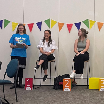 Three role models seated on a panel